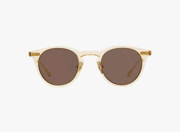 Front view of a pair of eyeglasses called the Alchemist in Nude