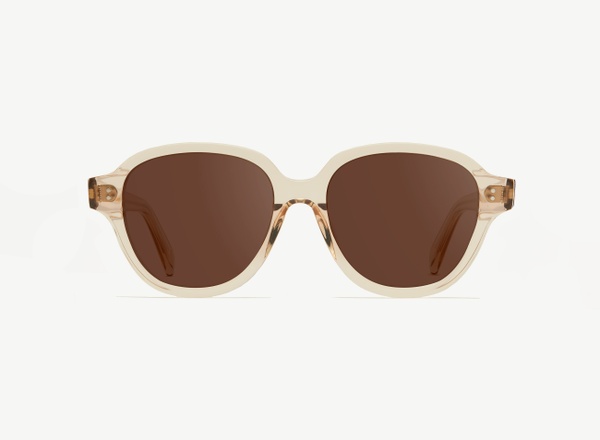 Front view of a pair of eyeglasses called the Altruist in Nude