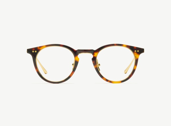 Front view of a pair of eyeglasses called the Alchemist in Tortoise