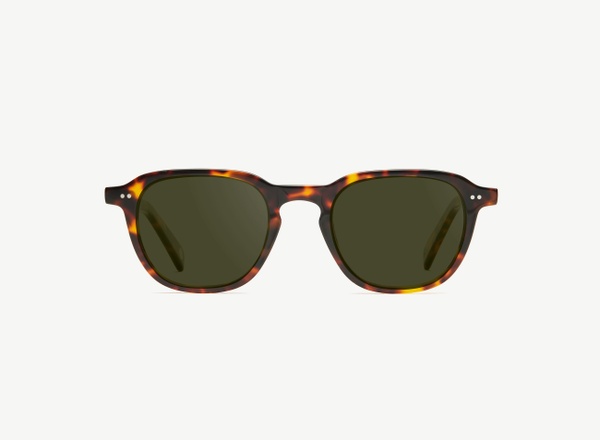 Front view of a pair of eyeglasses called the Doer in Tortoise