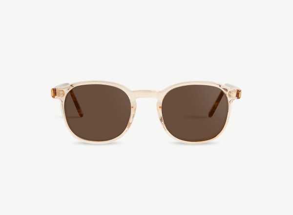 Front view of a pair of eyeglasses called the Idealist in Tan