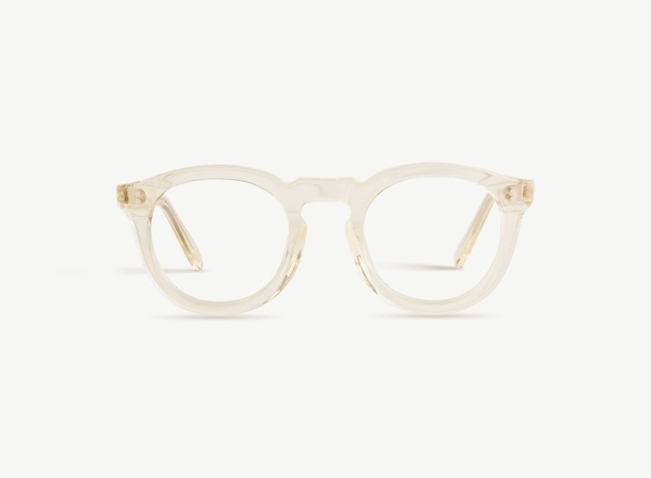 Front view of a pair of eyeglasses called the Charmer in Champagne
