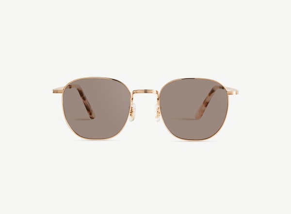 Front view of a pair of eyeglasses called the Trendsetter in Rose Gold